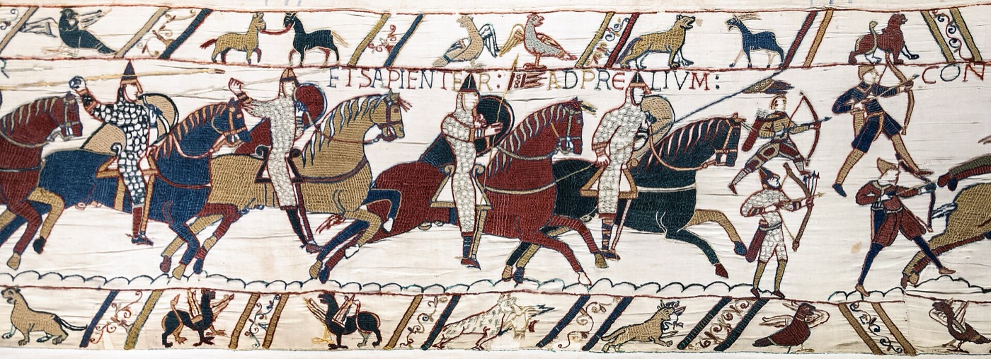Une scène de la broderie de Bayeux, cavaliers et archers de la bataille d'Hastings